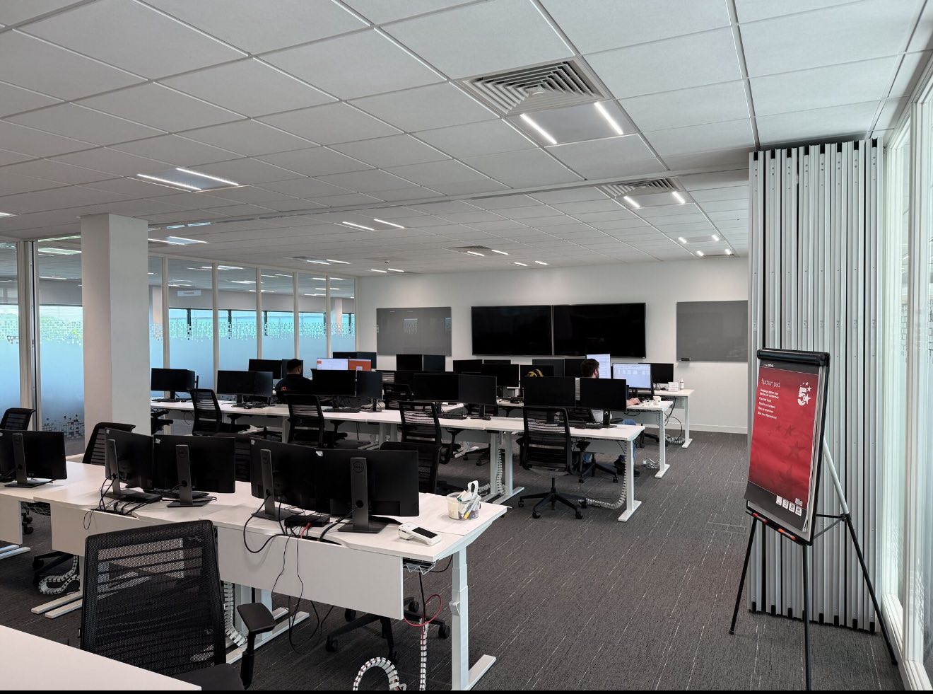 Folding acoustic partition system in Essex office