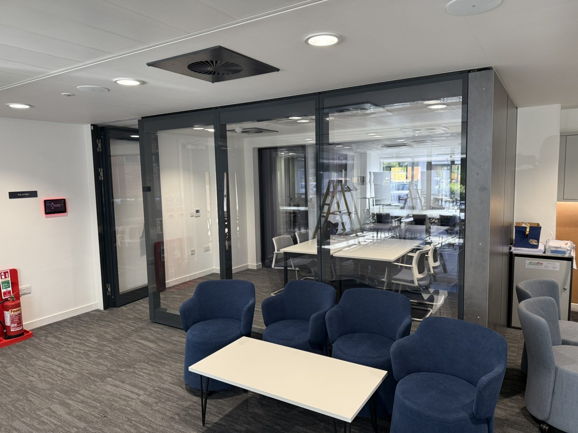 Sliding folding wall panels installed in North London